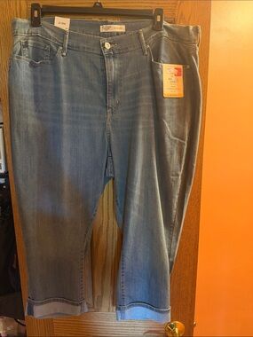 Women’s mid rise denim capri jeans with cuffed hems